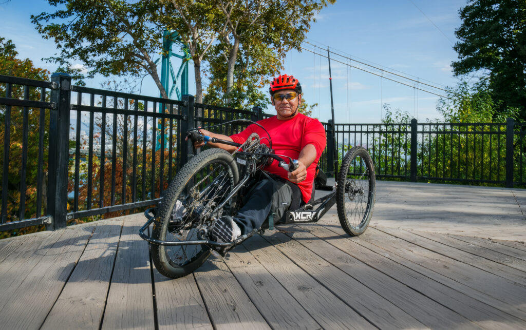 Smiling person in adaptive bike